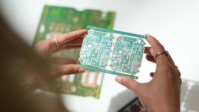 POV of a person holding a PCB, symbolizing the high quality you can expect from the copperdot service. Bosch has always stood for outstanding quality.