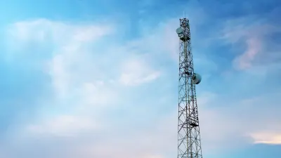 Image of a tele radio tower in front of blue sky
